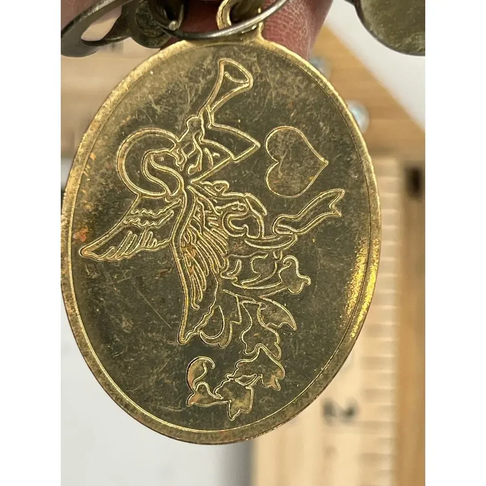 Vintage Brass Whistle Keychain with Angel Medallion Collectible Rustic Gift